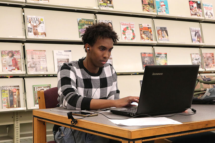 A Somali youth working at the Burnhaven branch library. (Photo: Dakota County Library)