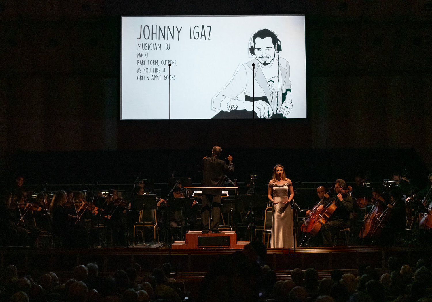 Soloist Patricia Westley sings Take Care of This House as a slideshow memorializing artists who passed in the Ghost Ship Fire (Photo: Anthony "Mogli" Maureal)